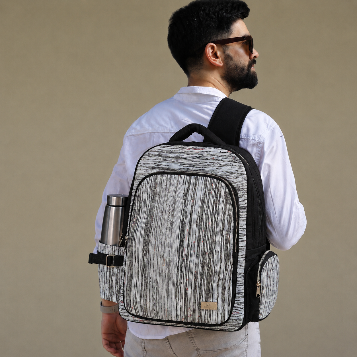 recharkha upcycled handwoven Commuter Backpack  made in India on Handloom and Charkha (Spindle)